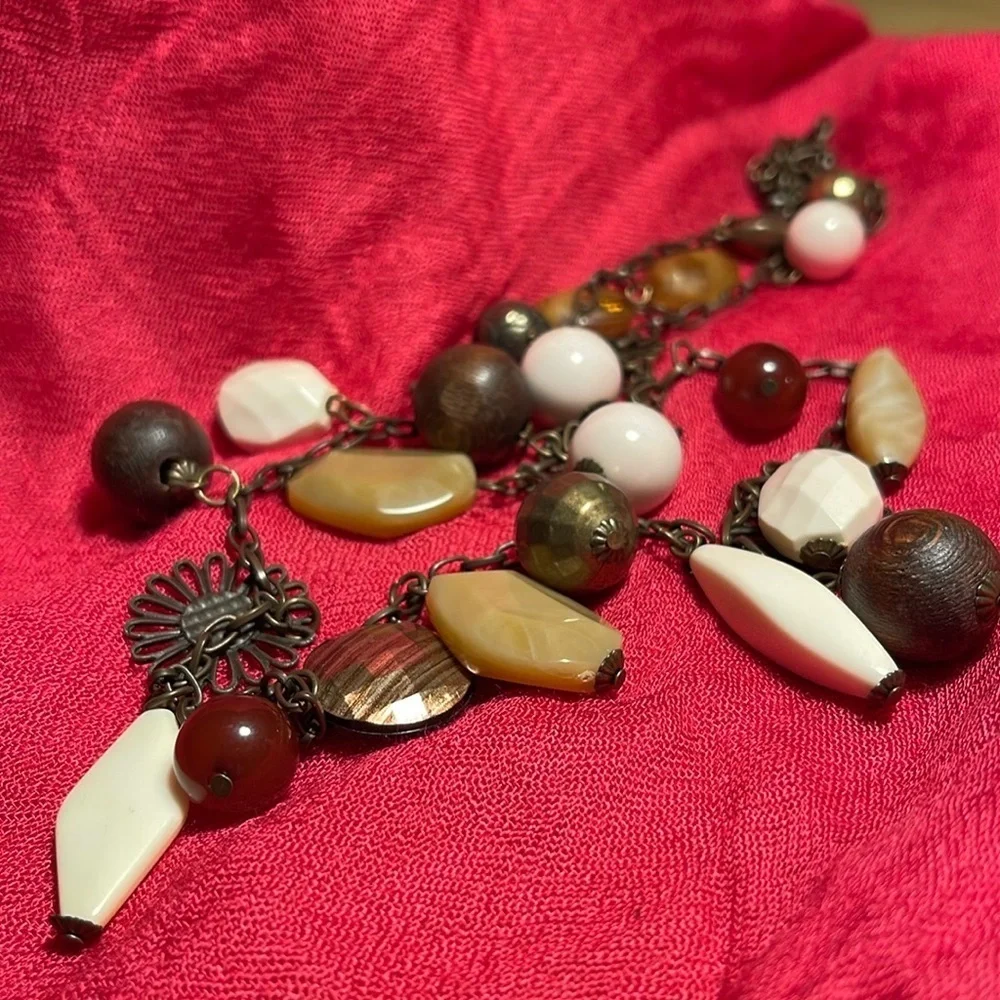36” Necklace with Dark Gold Tones, browns, beiges and white.